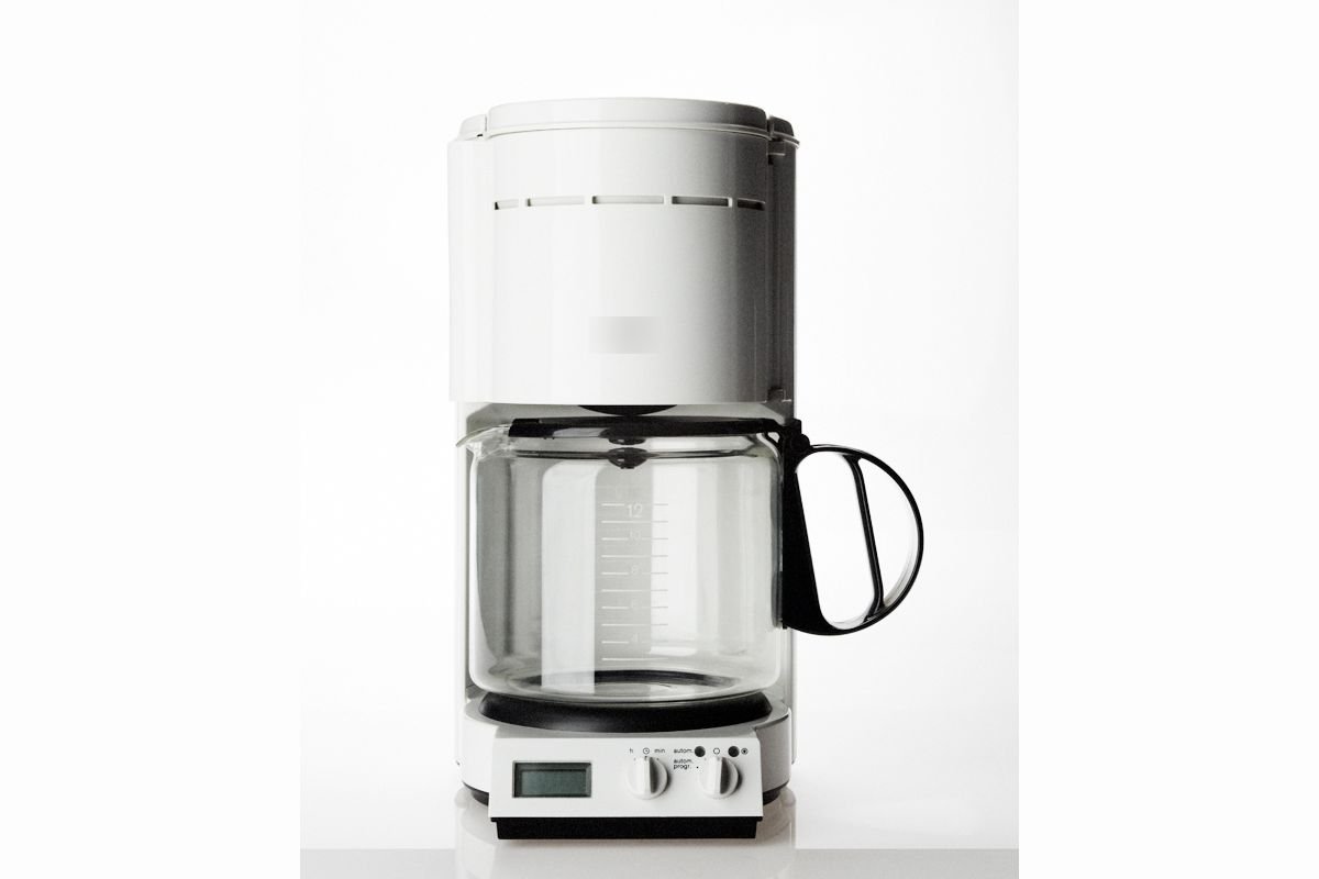White programmable drip coffee maker with a 12-cup glass carafe on a white background (representative photo, not the exact product)