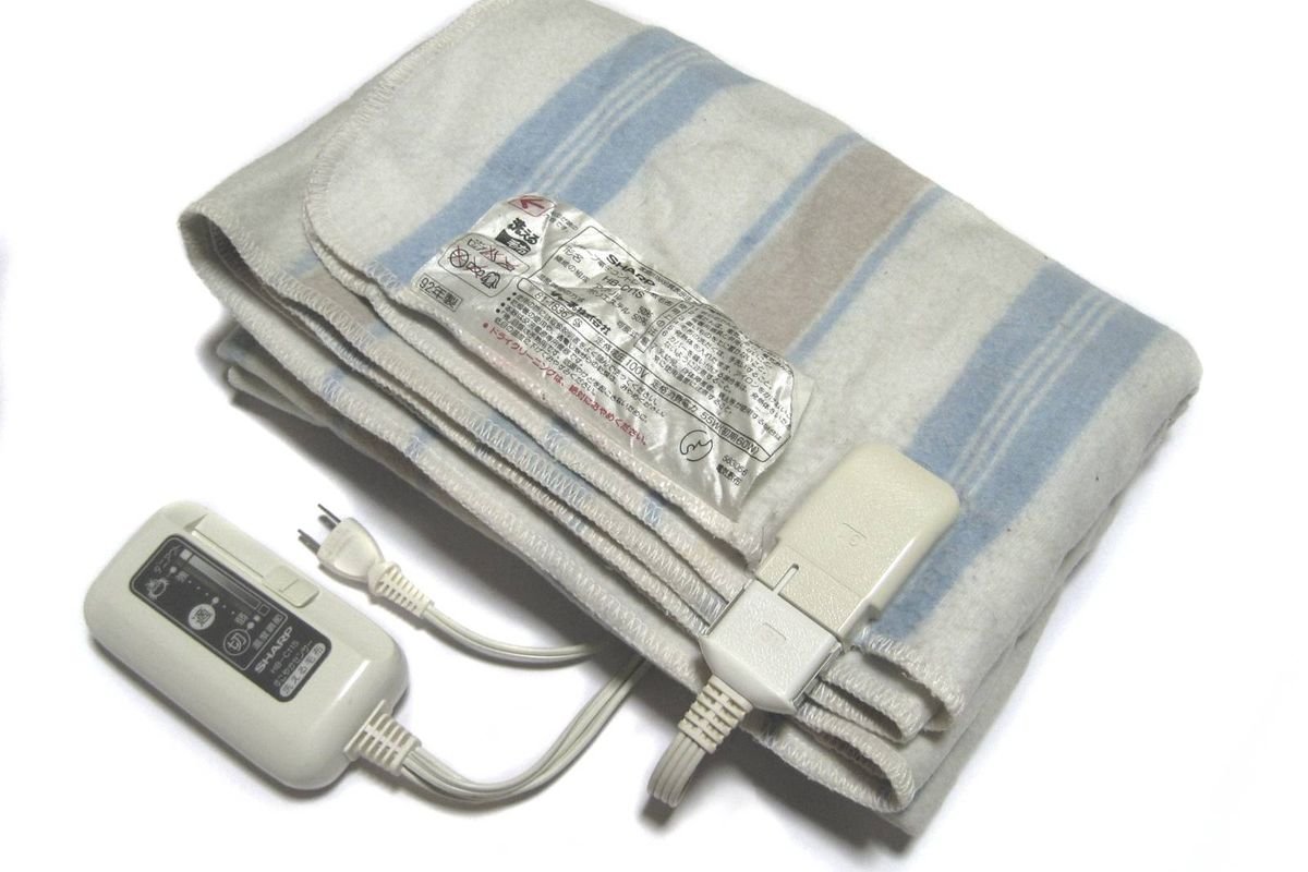 Folded striped electric blanket with its detachable heat controller (representative photo, not the exact product)