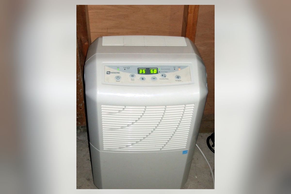 Silver home dehumidifier with a digital control panel (representative photo, not the exact product)