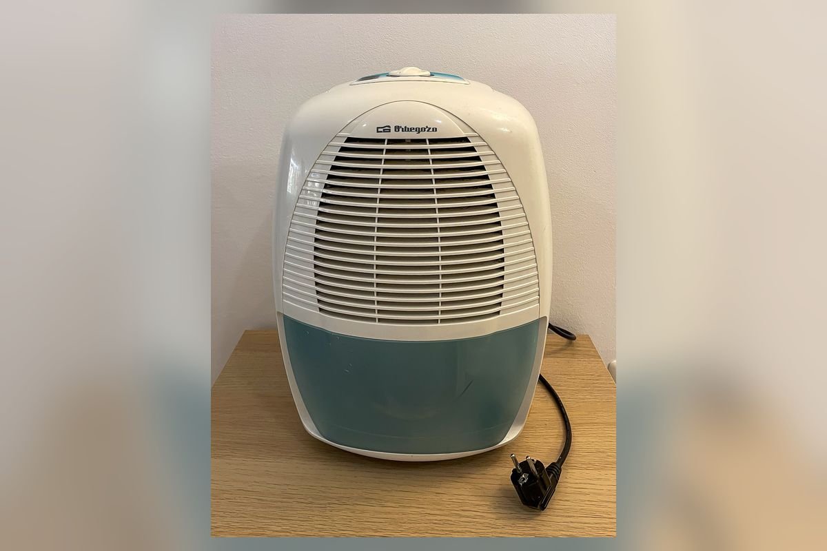 Small white compact dehumidifier with a power cord (representative photo, not the exact product)