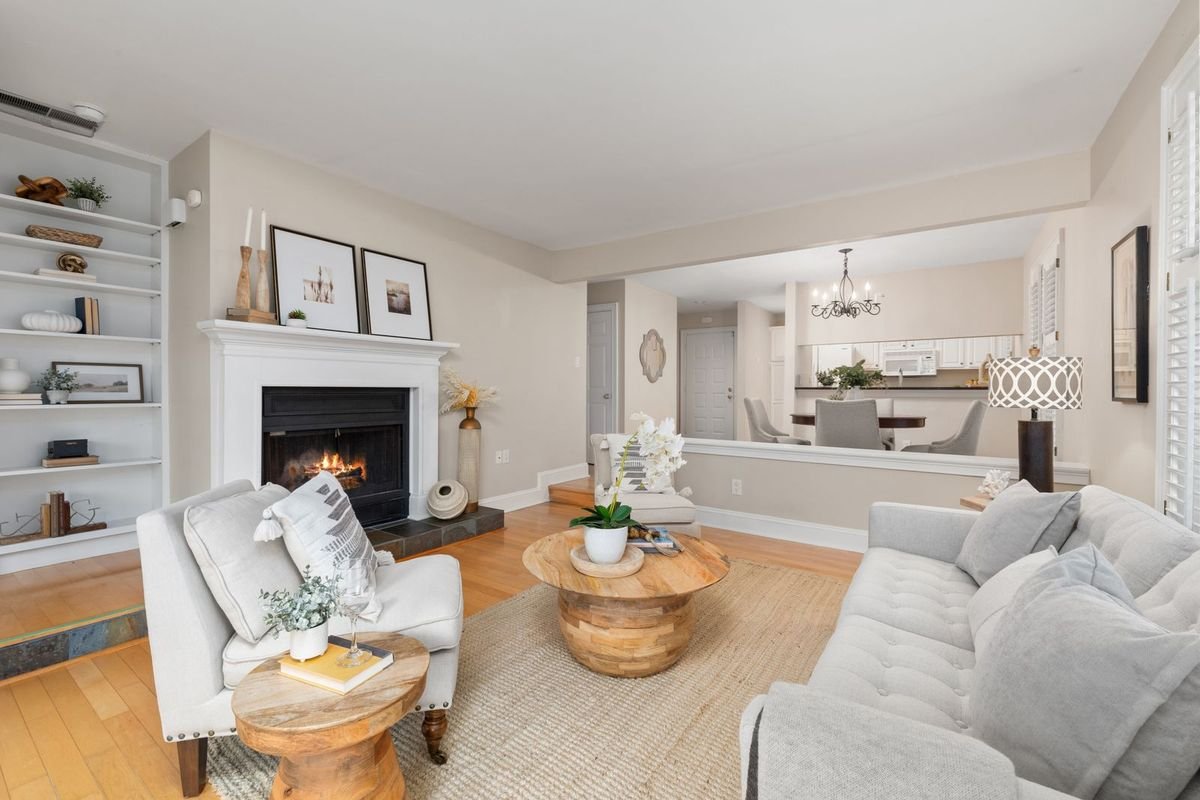 Living room with a white fireplace surround and chic decor (representative photo, not the exact product)