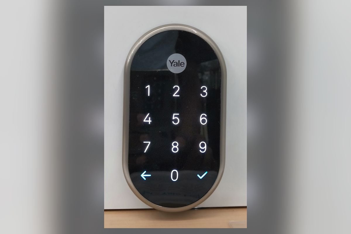 Touchscreen keypad smart lock with a lit number pad (representative photo, not the exact product)
